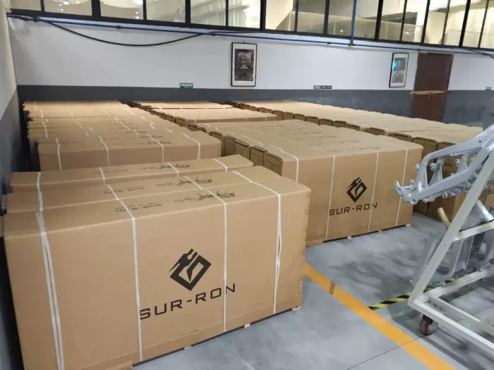 Surron_factory_boxes-700x524-1.webp